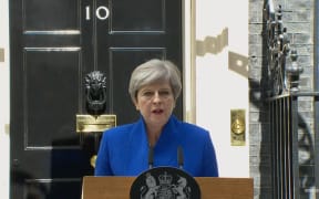 Theresa May announces she will form a government