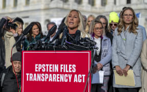 US Representative Marjorie Taylor Greene, Republican of Georgia speaks during a press conference on the "Epstein Files Transparency Act" at the US Capitol in Washington, DC on November 18, 2025. US lawmakers are expected to advance a bill on Tuesday requiring the release of government records on sex offender Jeffrey Epstein, in defiance of President Donald Trump's attempts to keep a lid on one of the country's most notorious case files. (Photo by DANIEL HEUER / AFP)