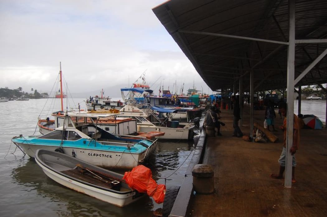Boats at the port of Alotau in Milne Bay Province, Papua New Guinea, 2011.