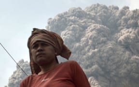 Scorching ash threatened villages in Karo district.