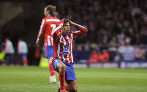 Giuliano Simeone of Atletico de Madrid reacts to a missed opportunity.