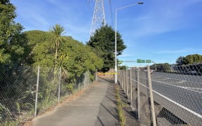 A police cordon by SH1 Highbrook Drive motorway on ramp.