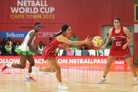 Hulita Veve of Tonga pass to Uneeq Palavi during the Netball World Cup 2023 Pool A match between Tonga and Zimbabwe at CTICC Court 2 on July 30, 2023 in Cape Town, South Africa.