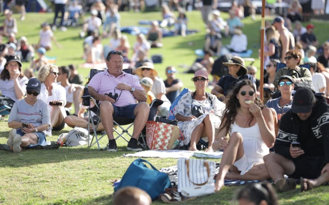 America's Cup fans watch race 10 from Takapuna Beach.