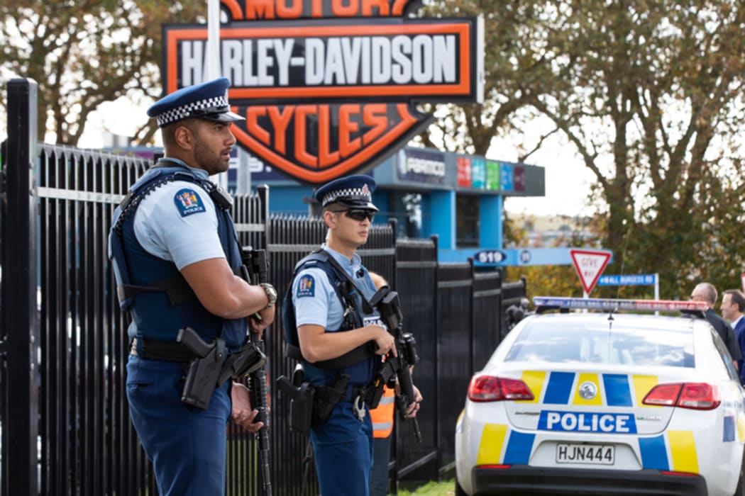 Armed police are standing guard outside the Harley Davidson story in Mt Wellington after a man was shot.