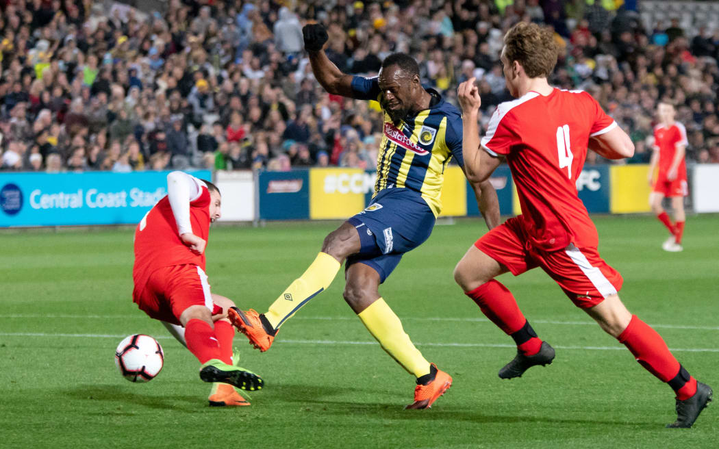 Usain Bolt in action for a pre-season match for the Central Coast Mariners.