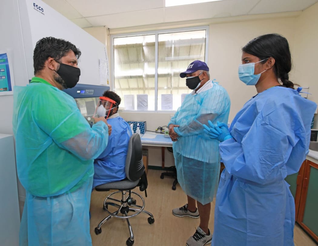 Fiji's Attorney-General Aiyaz Sayed-Khaiyum and Prime Minister Frank Bainimarama visit Fiji's Centre for Disease Control.