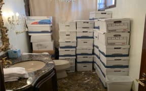 This undated image, released by the US District Court Southern District of Florida, attached as evidence in the indictment against former US president Donald Trump shows stacks of boxes in a bathroom and shower allegedly in the Lake Room at Mar-a-Lago, the former presidents private club. Federal prosecutors unsealed a wide-ranging indictment of Donald Trump on Friday, accusing the former US president of endangering national security by holding on to top secret nuclear and defense documents after leaving the White House. (Photo by Handout / US DEPARTMENT OF JUSTICE / AFP) / RESTRICTED TO EDITORIAL USE - MANDATORY CREDIT "AFP PHOTO / US DISTRICT COURT SOUTHERN DISTRICT OF FLORIDA" - NO MARKETING NO ADVERTISING CAMPAIGNS - DISTRIBUTED AS A SERVICE TO CLIENTS