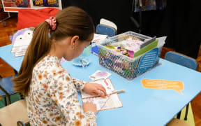 One of the children at the safe havens and child rights education exhibition.
