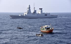 Sailors on French destroyer FS Chevalier Paul intercept a dhow in the Indian Ocean in November.