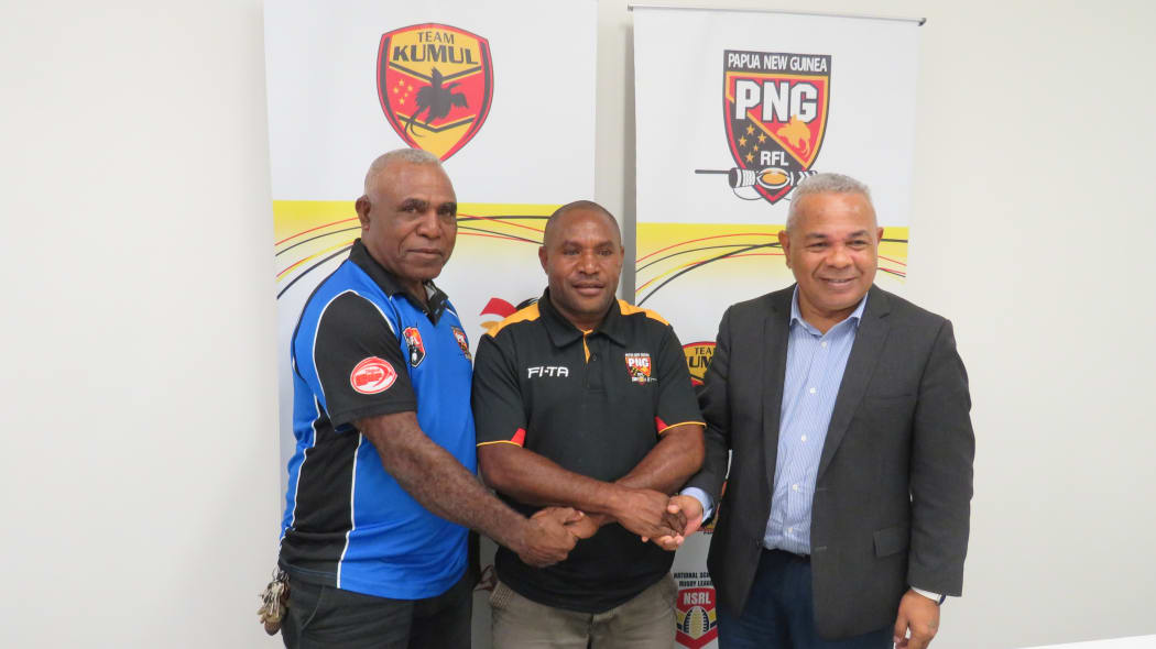 PNG Referees Director, Joe Peregua, referee Paul Wani and PNGRFL CEO Reatau Rau.
