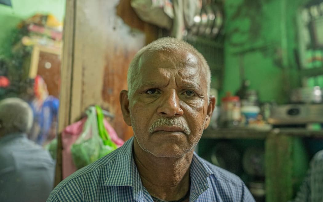 Ravi Thakor's father, Prahlad Thakor, who lost his wife and granddaughter.