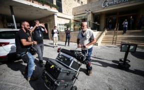 Inspectors and police raid Al Jazeera offices in Jerusalem, Israel, on 5 May, 2024, and confiscate its equipment.
