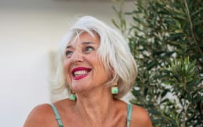 A woman in her 60s.