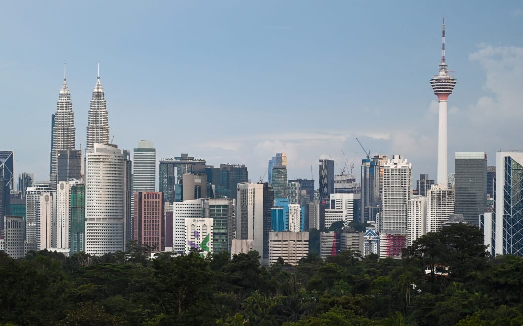 A general skyline view of Malaysia’s capital Kuala Lumpur on October 25, 2020. (Photo by Mohd RASFAN / AFP)