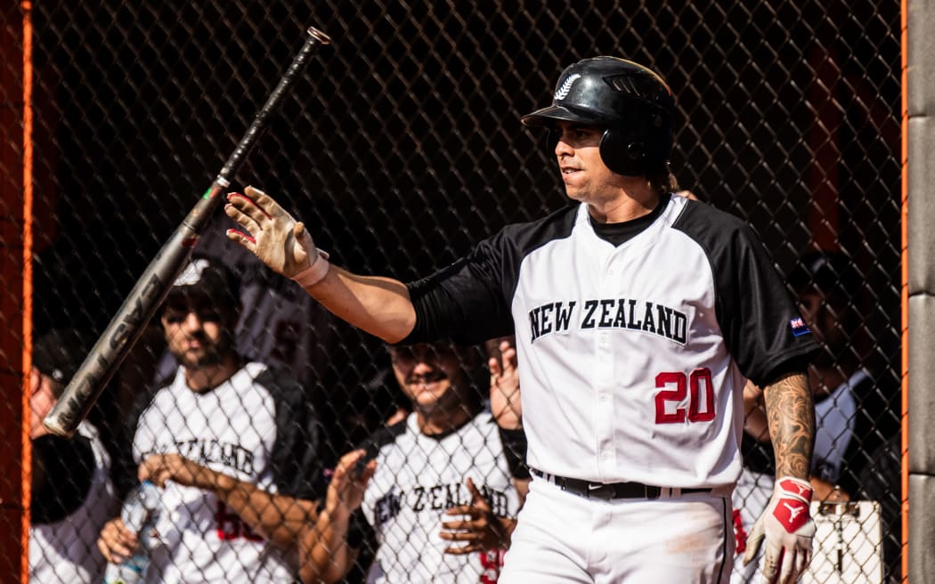 Black Sox utility, Thomas Enoka at the Softball Mens World Cup 2019 on Game Day 9, New Zealand vs Australia. Photo Grega Valancic / WBSC