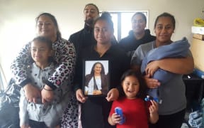 Miria Esera (left) with her family.