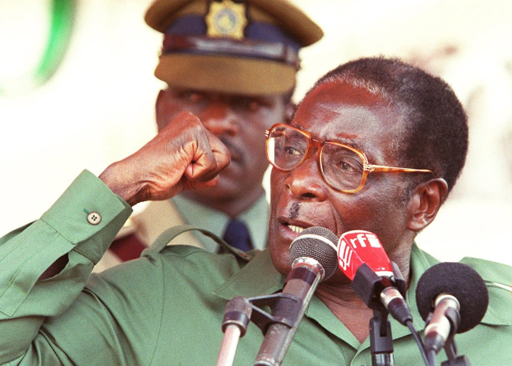 This file photo taken on April 08, 2000 shows Zimbabwe President Robert Mugabe speaks at his first election rally for the coming Parliamentary elections in Bindura, 80 kilometers north of Harare.