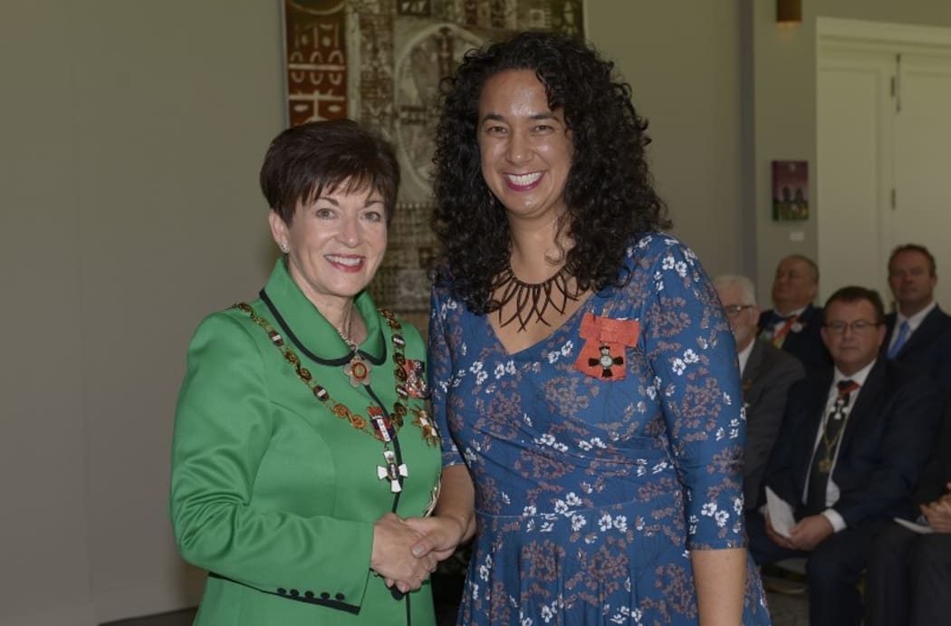Her Excellency The Rt Hon Dame Patsy Reddy presents Ms Petrina Togi-Sa’ena her MNZM for services to Pacific music.