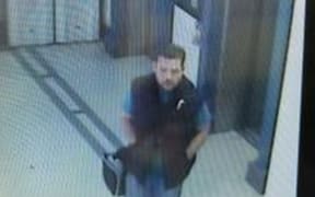 Police have released security footage of a man leaving a hotel near Albert Street.