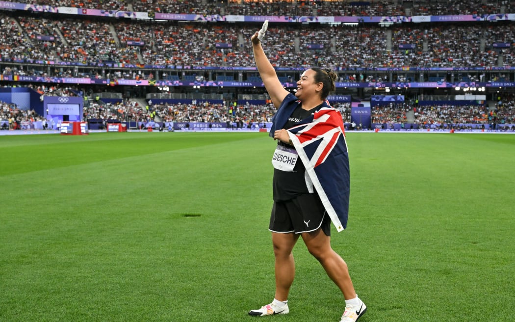 Silver medallist New Zealand's Maddison-Lee Wesche celebrates after the women's shot put final of the athletics event at the Paris 2024 Olympic Games at Stade de France in Saint-Denis, north of Paris, on August 9, 2024. (Photo by Andrej ISAKOVIC / AFP)