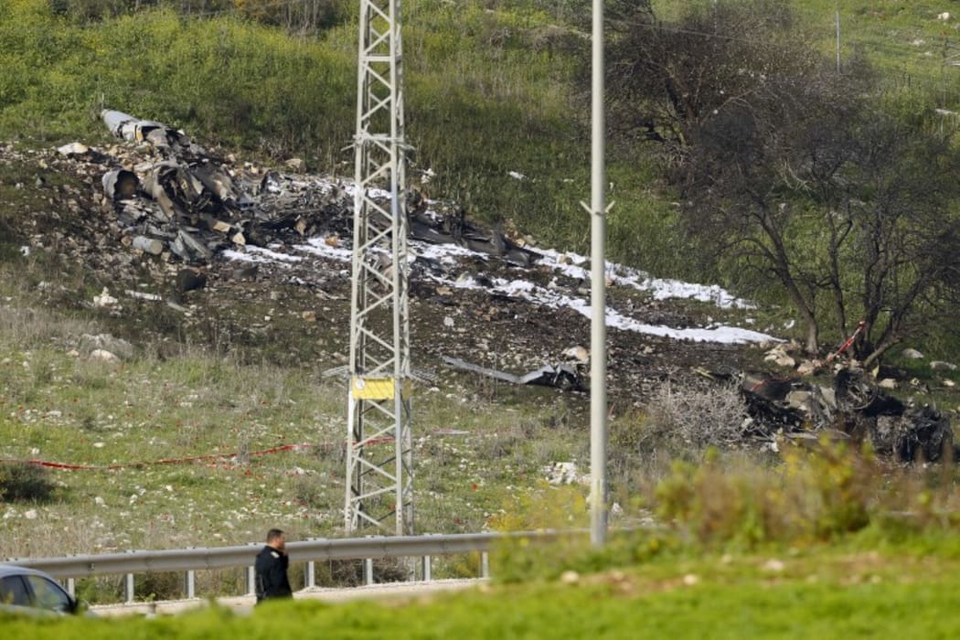 The remains of an Israel F-16 that crashed after coming under fire by Syrian air defences during attacks against "Iranian targets" in the war-torn country.