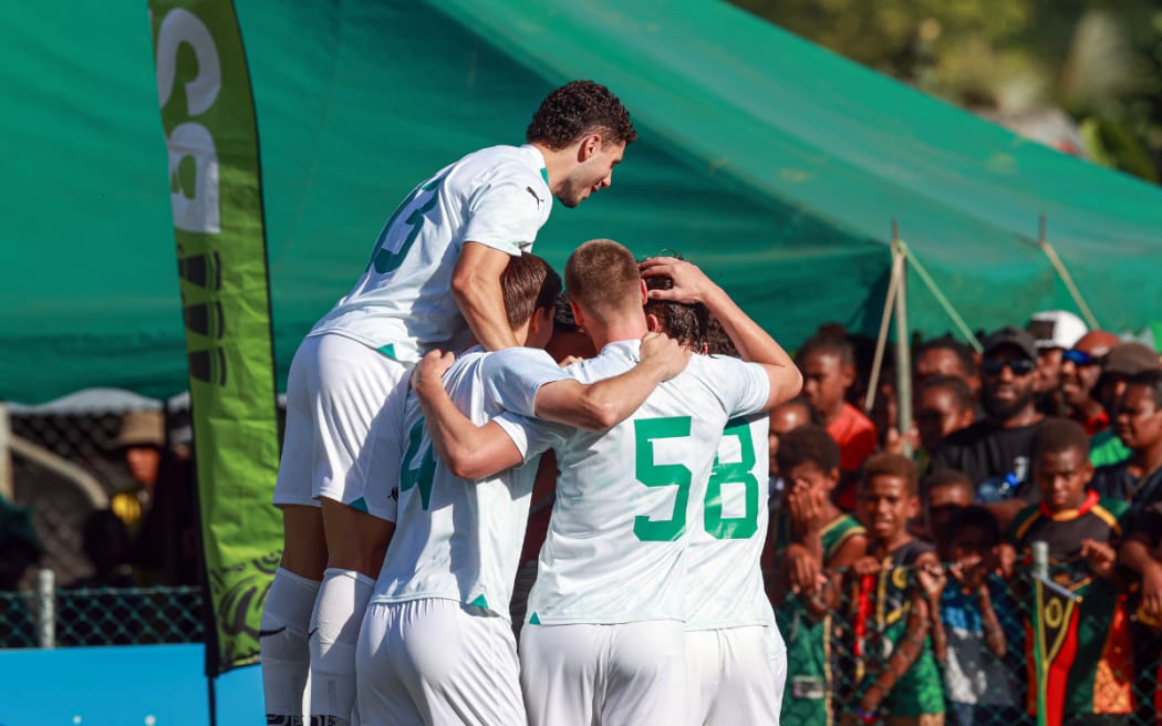 The All Whites celebrate a goal in their 3-0 win over Vanuatu in the OFC Nations Cup final in Port Vila.