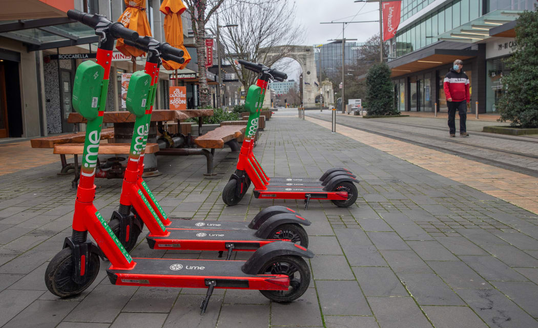 Parked electric scooters in deserted path, are seen in Christchurch, New Zealand, on August 27, 2021. New Zealand Prime Minister Jacinda Ardern has confirmed Auckland will remain in alert Level 4 lockdown until 31st August 2021 as the country battles with the latest COVID-19 outbreak.