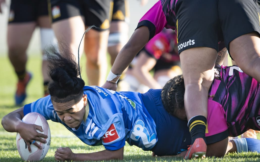 Blues first five-eighth Patricia Maliepo scores the opening try