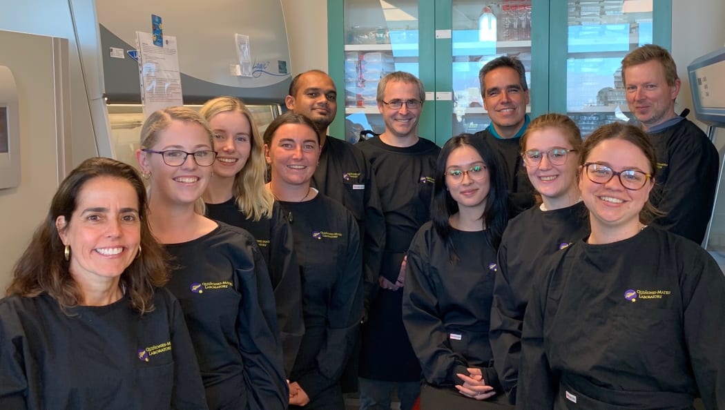 Members of the University of Otago Containment Lab team working on COVID