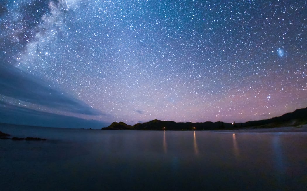 Star shot across still water