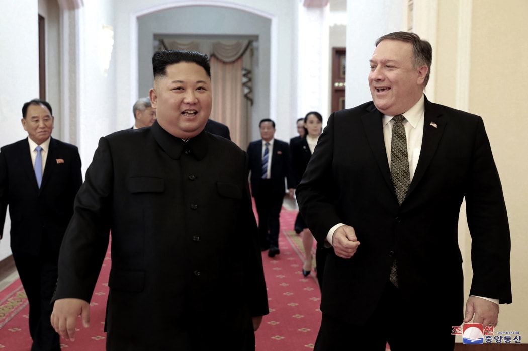 North Korean leader Kim Jong Un, center left, and US Secretary of State Mike Pompeo walk together before their meeting in Pyongyang, North Korea.