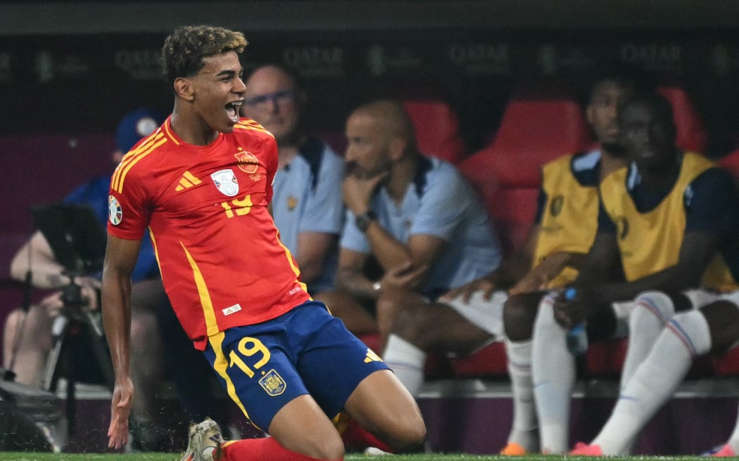 Spain forward Lamine Yamal celebrates scoring his team's first goal during the Euro 2024 semi-final against France.