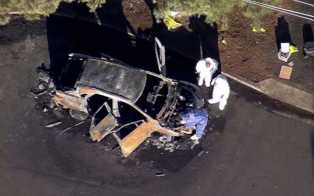 Fire and Rescue NSW says it was very rare for crews to find a person in a vehicle.
