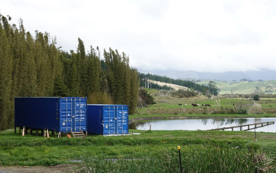 Rāwene’s new electrocoagulation unit, in shipping containers next to the sewage ponds, is ready to be turned on.