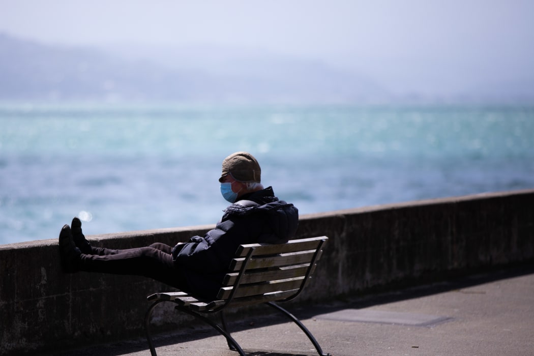 Man wearing a mask on Oriental Parade