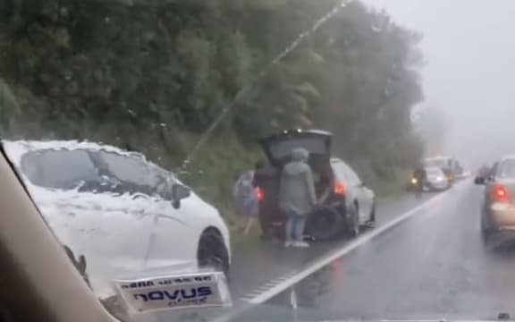 Dozens of cars were shown in a video online damaged by potholes.