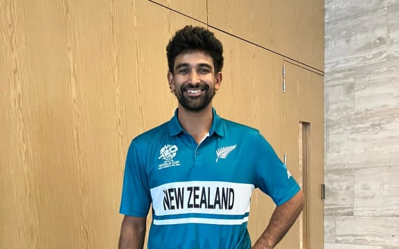 Black Cap Ish Sodhi in the new teal uniform.