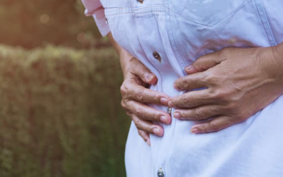 Endometrial cancer symptoms can include cramping and abnormal bleeding or spotting.