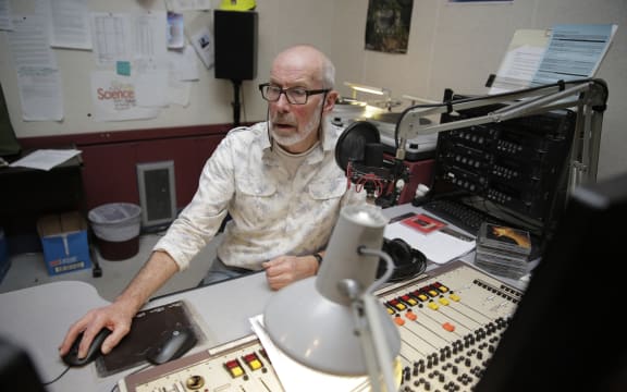 Lloyd in the studio for his final all-night broadcast.
