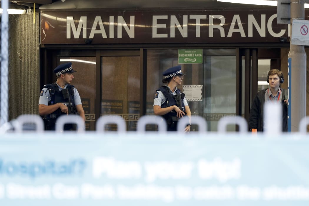 Police stand guard at Christchurch Hospital.