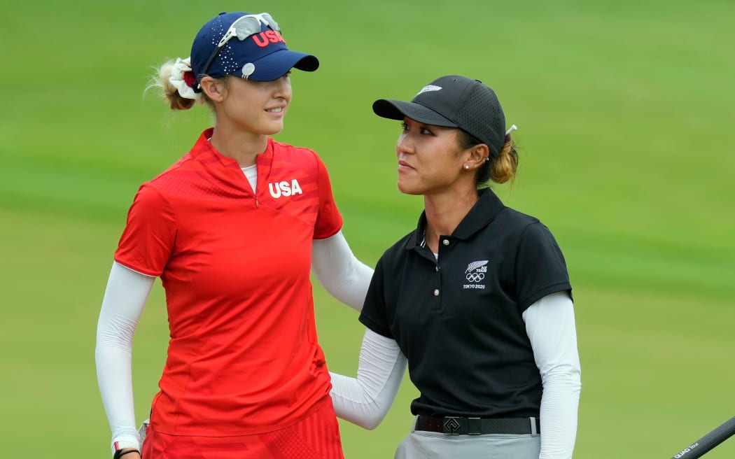 Nelly Korda (L) and Lydia Ko during the Tokyo 2020 Olympic Games women's golf tournament.