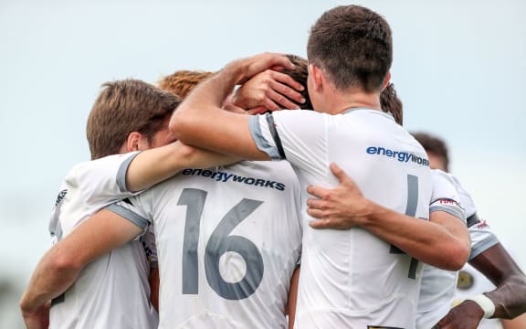 Team Wellington's Angus Kilkolly celebrates his goal.