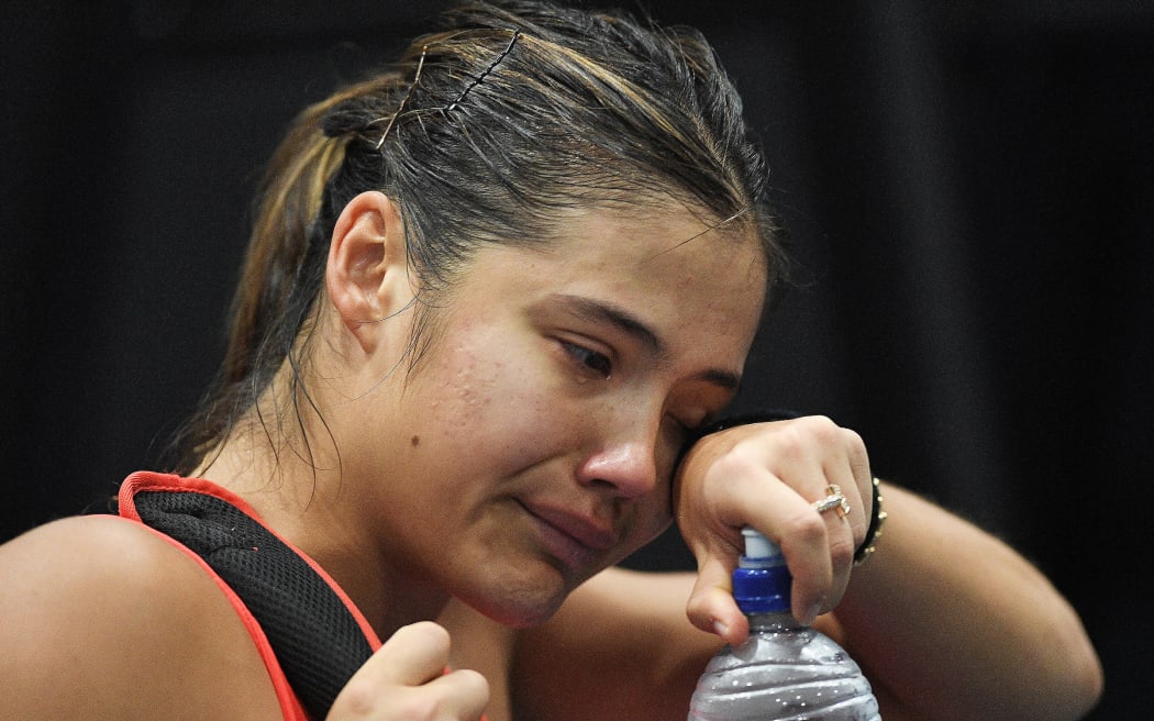 A distraught Emma Raducanu of Great Britain retires hurt during play on day four of the 2023 ASB Classic, 5 January 2023.