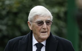 Sir Michael Parkinson attends the funeral service of British comedian Ronnie Corbett in Croydon on April 18, 2016. Ronnie Corbett, one of Britain's most popular comedians, best known for "The Two Ronnies", his double-act with Ronnie Barker, died on March 31,  aged 85. (Photo by ADRIAN DENNIS / AFP)