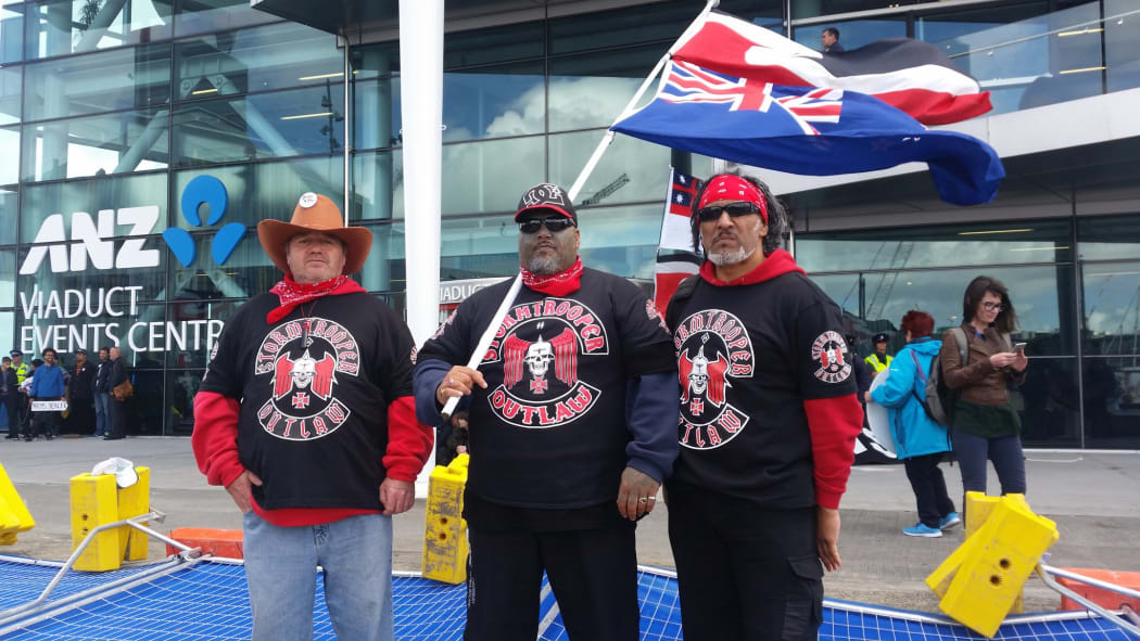 Protesters demand an end to the weapons conference.