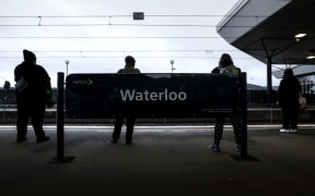 Commuters at Waterloo train station.