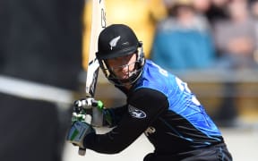 Martin Guptill all concentration on the way to his second century of the World Cup