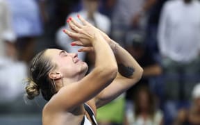 Belarus's Aryna Sabalenka reacts after defeating USA's Amanda Anisimova during their women's singles final tennis match on day fourteen of the US Open tennis tournament at the USTA Billie Jean King National Tennis Center in New York City, on September 6, 2025. (Photo by CHARLY TRIBALLEAU / AFP)