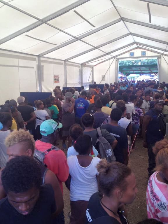 A common scene across Solomon Islands as people line up to register to vote in next year's national and provincial elections. Town Ground, Honiara. September 2018.